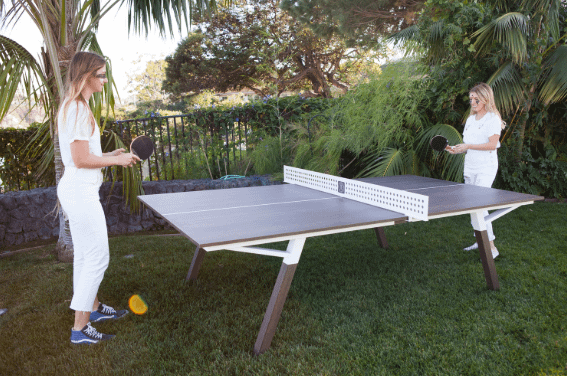 Playing ping pong outside